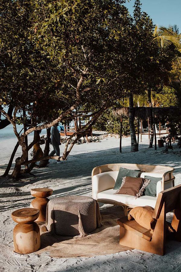Two wooden stools and chair wedding furniture for Holbox, Mexico, destination beach wedding