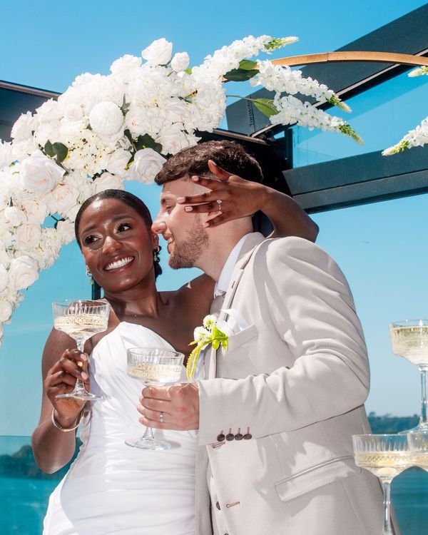 Bride and groom for coastal wedding by the sea