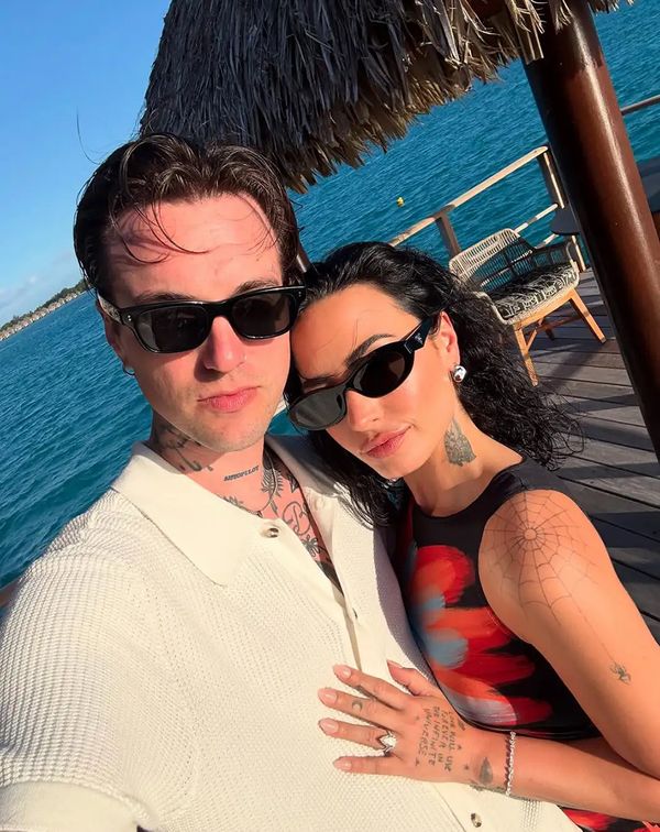 Demi Lovato on honeymoon with ocean backdrop celebrity honeymoon inspiration