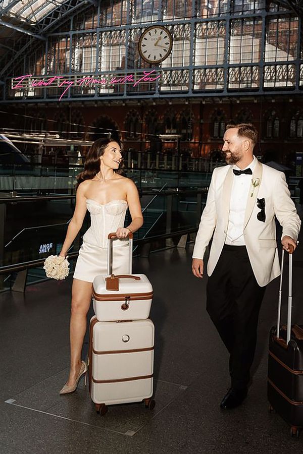 Couple with honeymoon luggage 