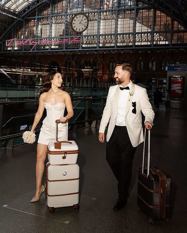 Couple with honeymoon luggage
