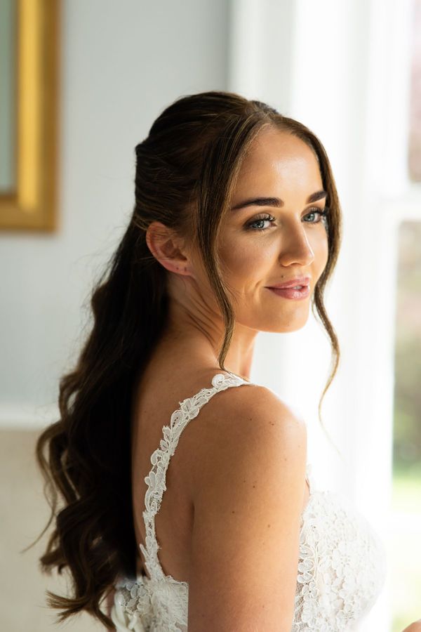 Bride with glowy skin on wedding morning