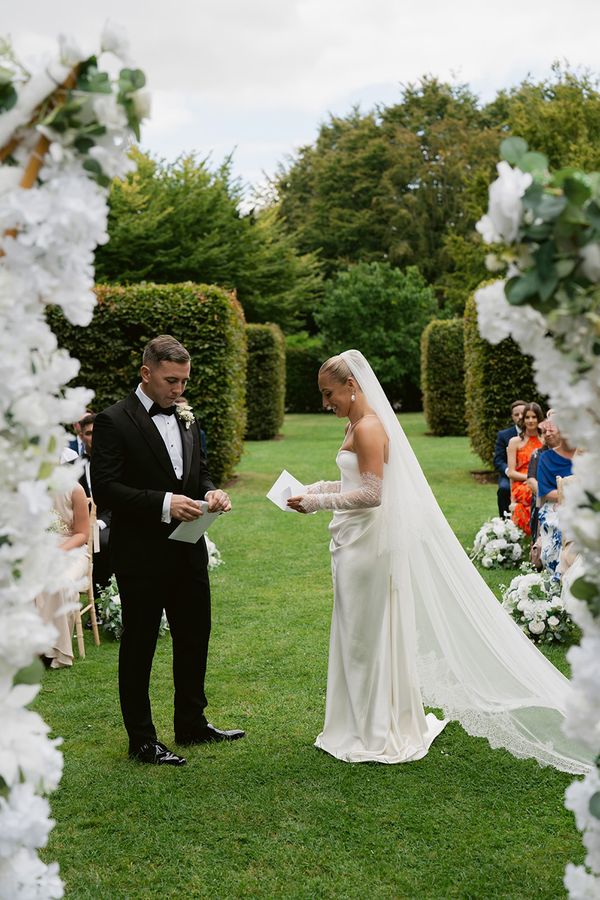 bride and groom exchanging wedding vows