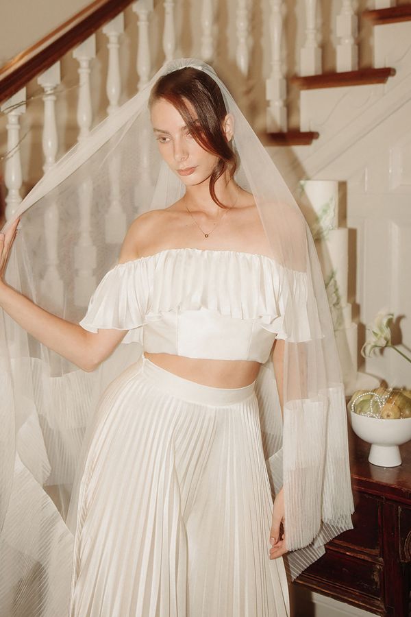 Two piece wedding dress with bardot crop top and pleated maxi skirt