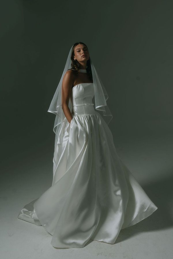 drop waist wedding dress with strapless neckline, boned bodice, thin belt and full skirt by Hera Couture