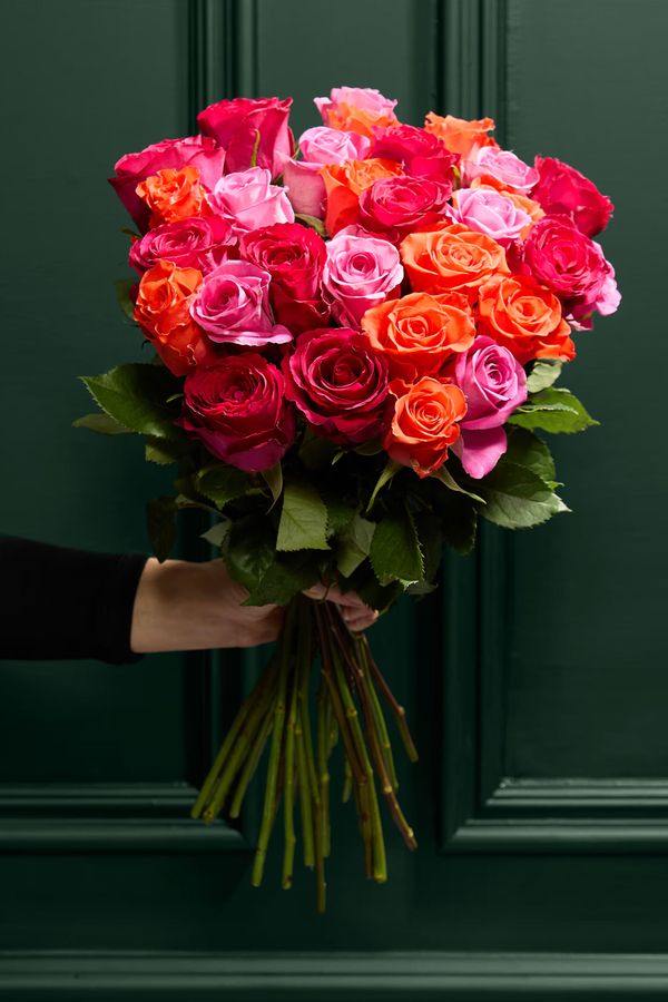 29 stems including Orange, Cerise and Pink Roses from M&S for wedding celebration flowers