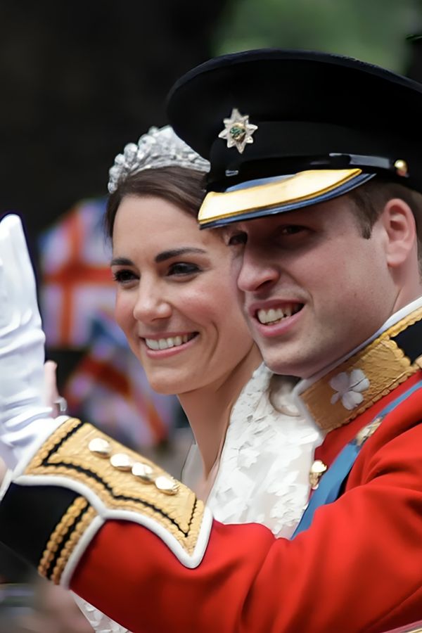 William and Kate's royal wedding, couple smiling and waving from carriage