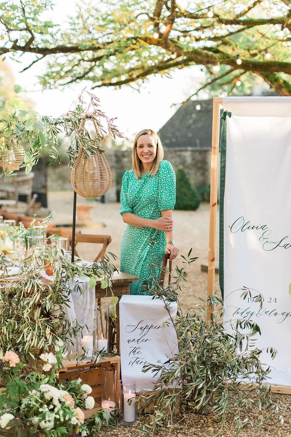 This is me in front of a Tuscan inspired tablescape at Merriscourt in the Cotswolds