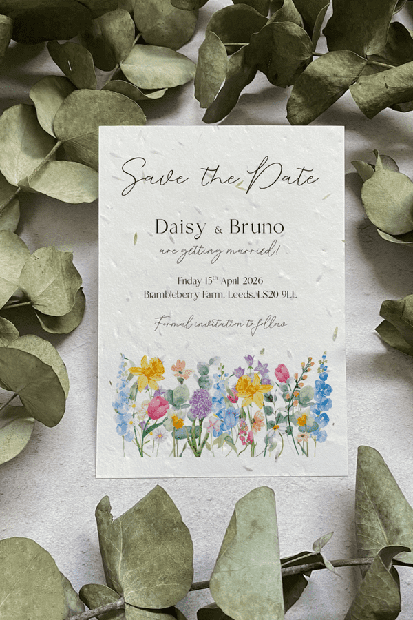 Spring Meadow save the dates printed on seed paper.