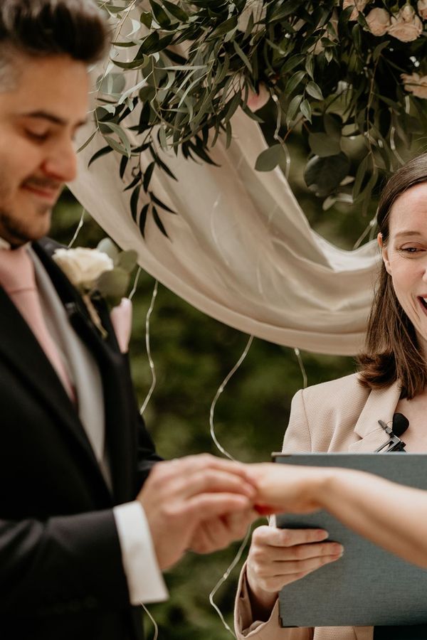 Yorkshire celebrant Rachael Bowers conducting a Greek inspired wedding ceremony in Harrogate, by Claire McClean Photography