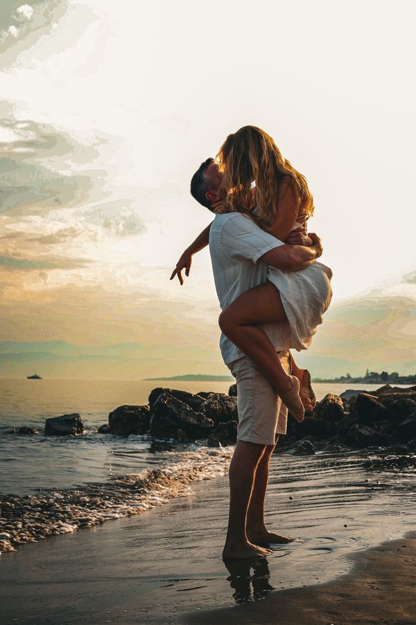 Engagement shoot on the beach. Relaxed and intimate capturing natural moments between the bride and groom Photography by evniyia photography 