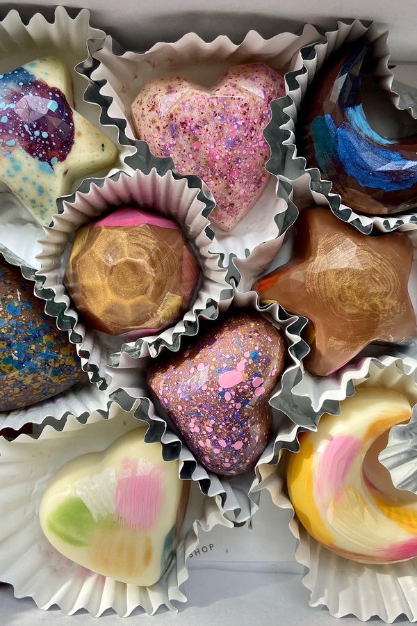 A selection of 10 chocolate bonbons, all a different flavour