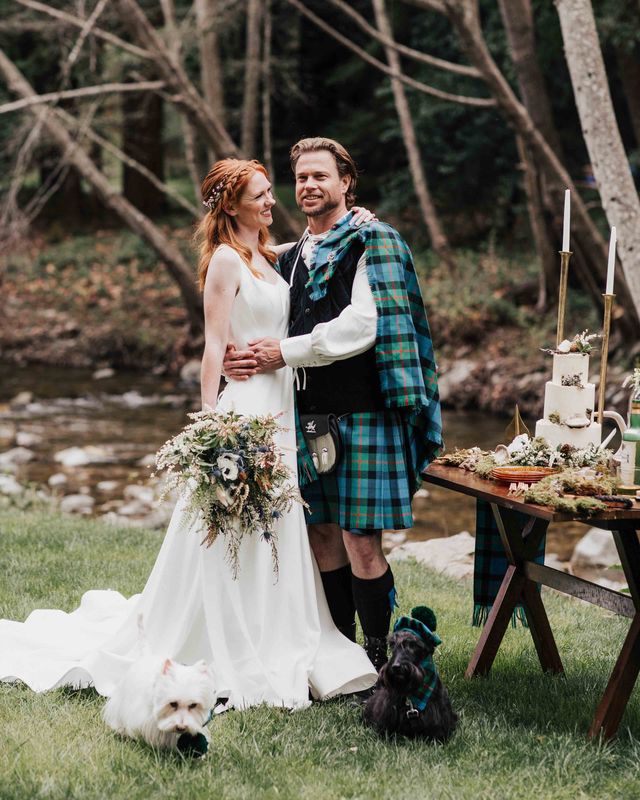 Scottish blue and green wedding inspiration with tartan kilts, a bagpiper, whiskey station and Scotty dogs.