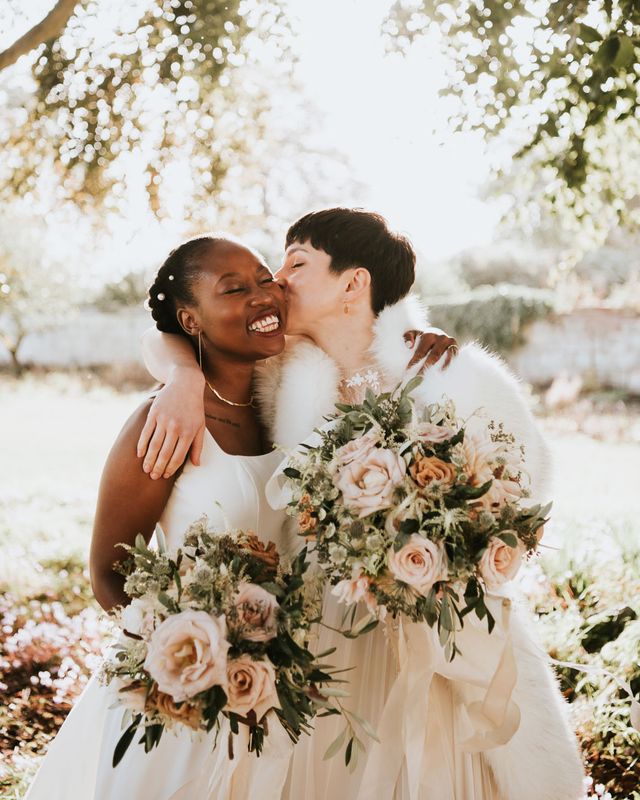 Romantic Elmore Court multicultural LGBTQI+ wedding with two brides