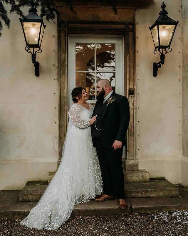 Groom in green tweed wedding suit with bride in lace dress at Aswarby Rectory.