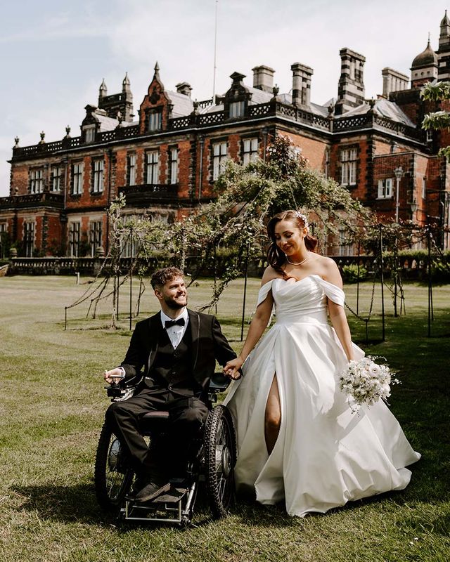 Italian style accessible wedding at Capesthorne Hall with inter able couple, white flowers, lemons & floral napkins by Opperhill Photography