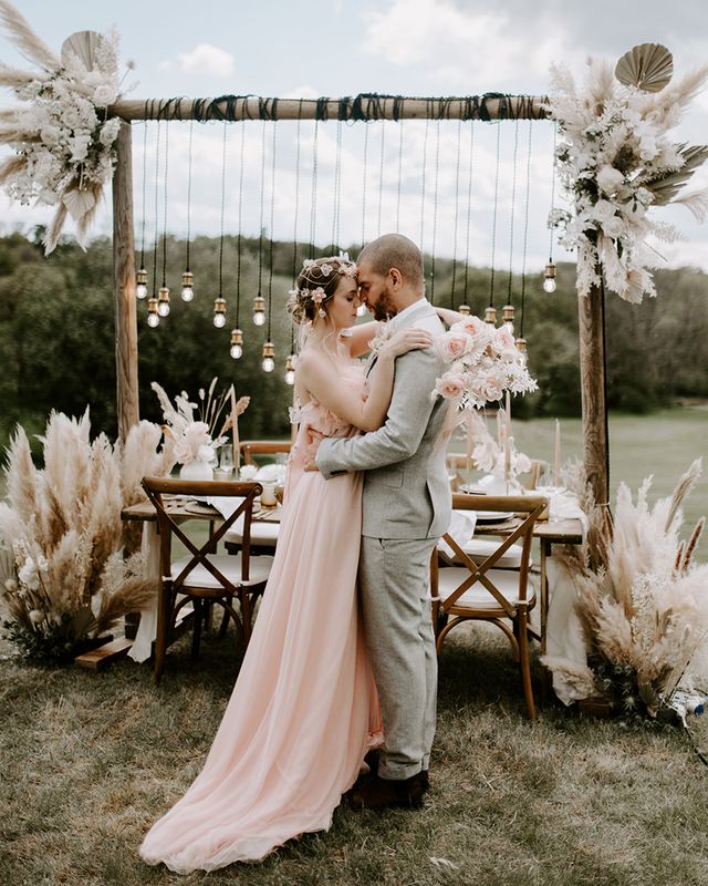 Boho luxe wedding inspiration at Waresley Park Estate with an outdoor reception, floral moon gate and blush wedding dress