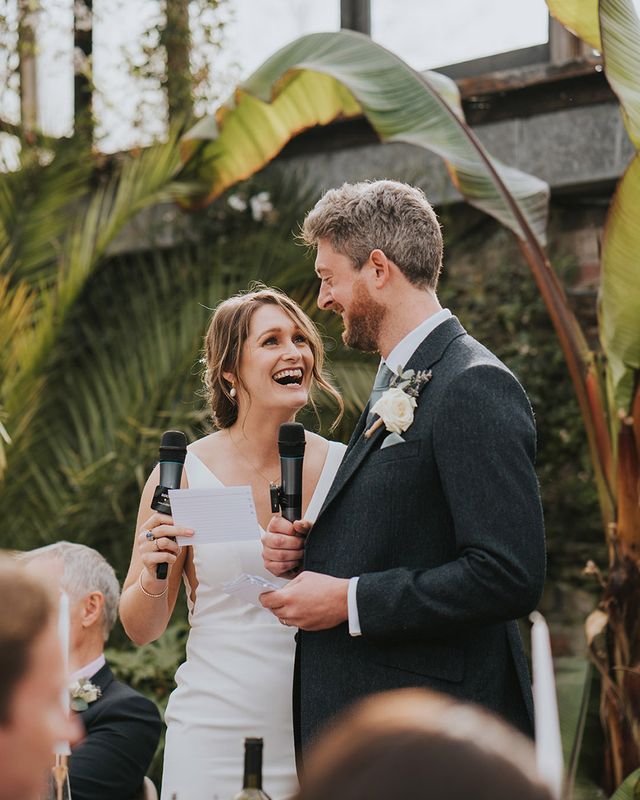 bride and groom performing their joint wedding speech