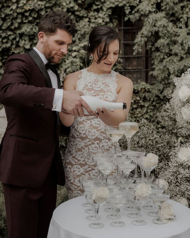 champagne tower at intimate dinner party wedding