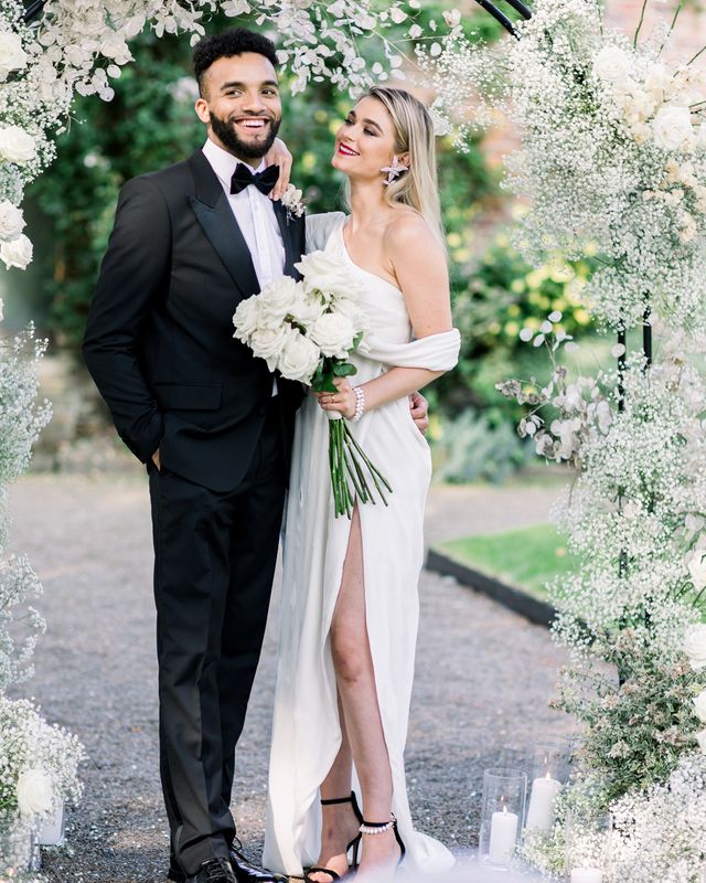 Sophisticated summer Garthmyl Hall wedding with white flowers and black tie fashion
