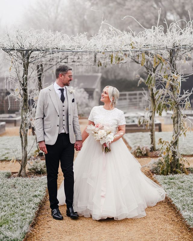Tulle bridal skirt and beaded top separates worn by bride for winter wedding.