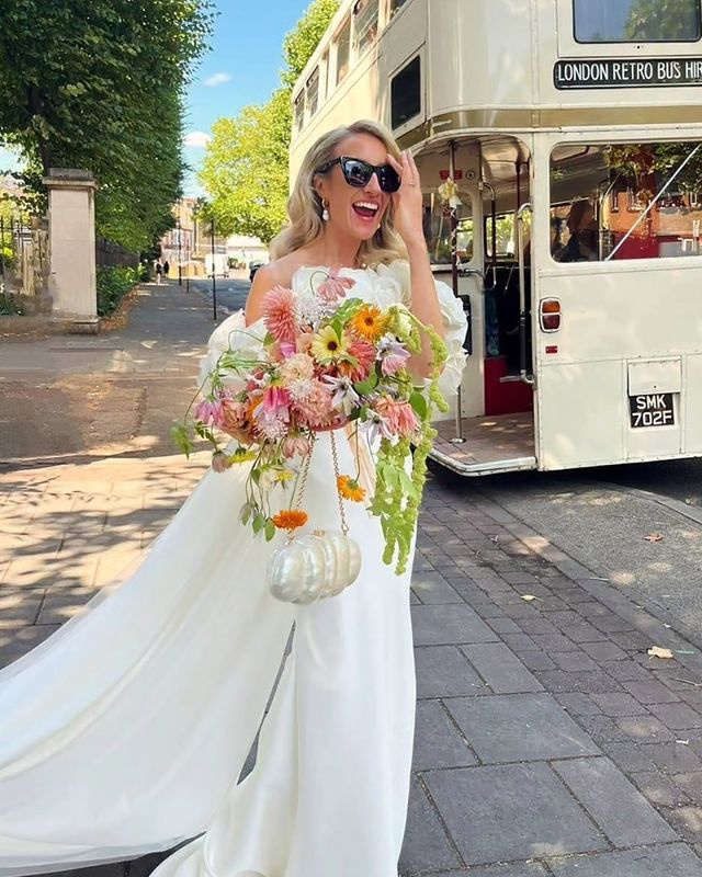 Bride wearing cult gaia rented wedding dress from by rotation