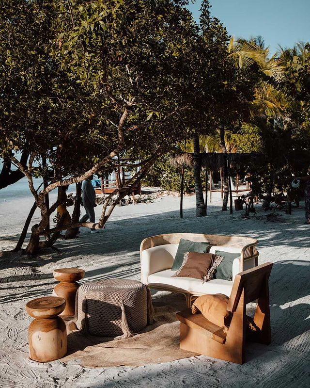 Two wooden stools and chair wedding furniture for Holbox, Mexico, destination beach wedding