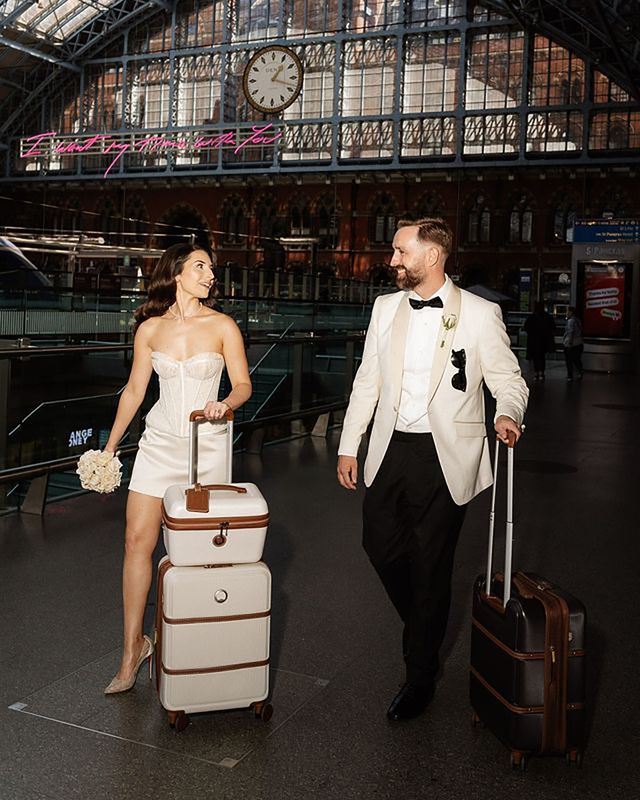 Couple with honeymoon luggage