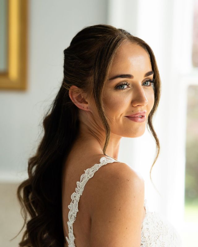 Bride with glowy skin on wedding morning