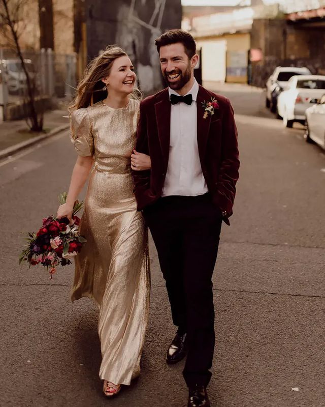 Bride wearing golden wedding dress