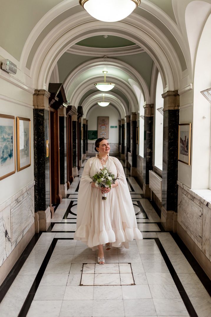 Bride in a Lanvin wedding dress with jewel encrusted shoes at her under 5k wedding 