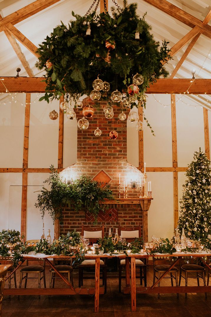 Christmas bauble decoration with plenty of foliage and a Christmas tree