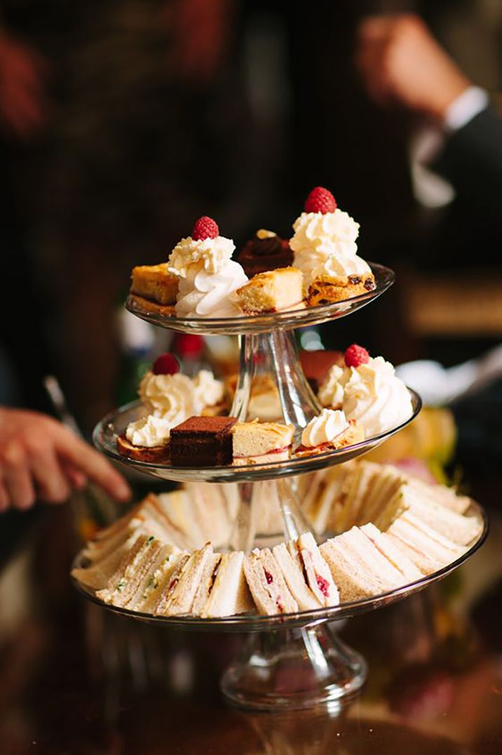 Afternoon tea stand with cakes and sandwiches by Lee Allen Photography 