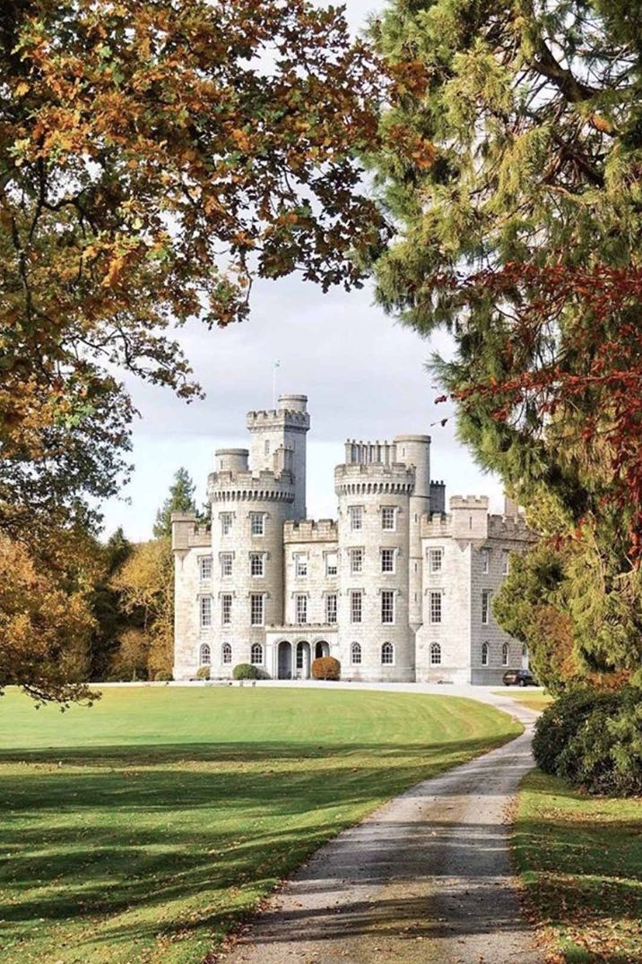 Exterior shot of manicured gardens of Cluny Castle wedding venue in Scotland 