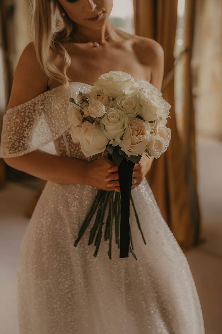 Christmas country house wedding with white roses for seasonal wedding 