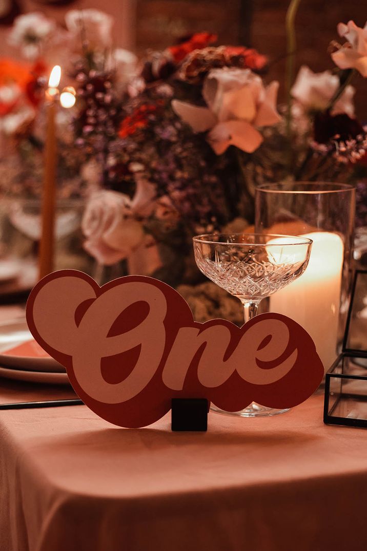 Pink and red retro style wedding table number for romantic Valentine's theme wedding 