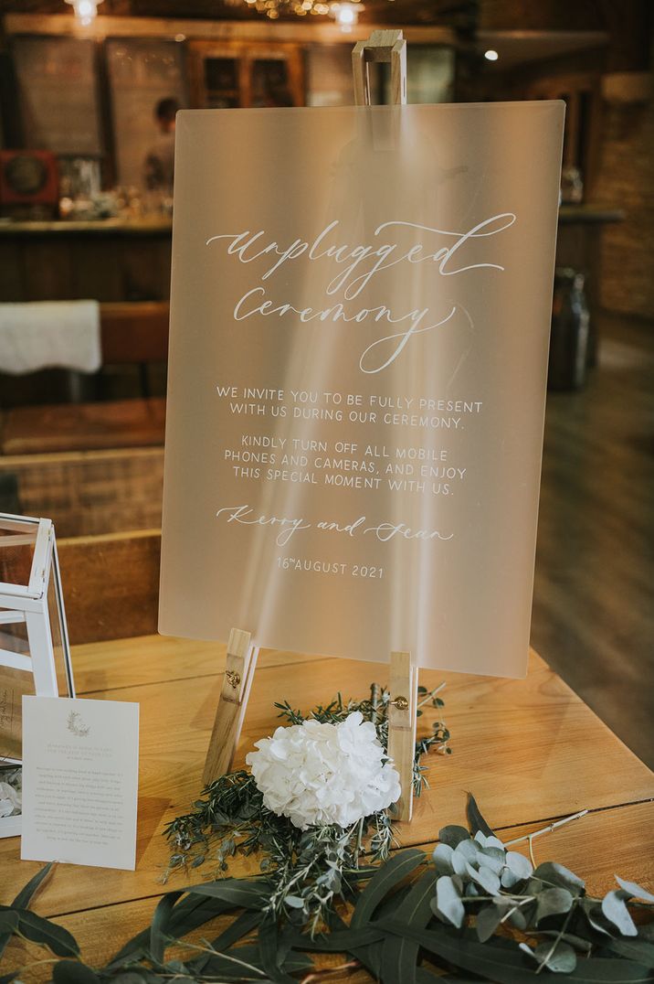 Frosted acrylic unplugged wedding ceremony sign 