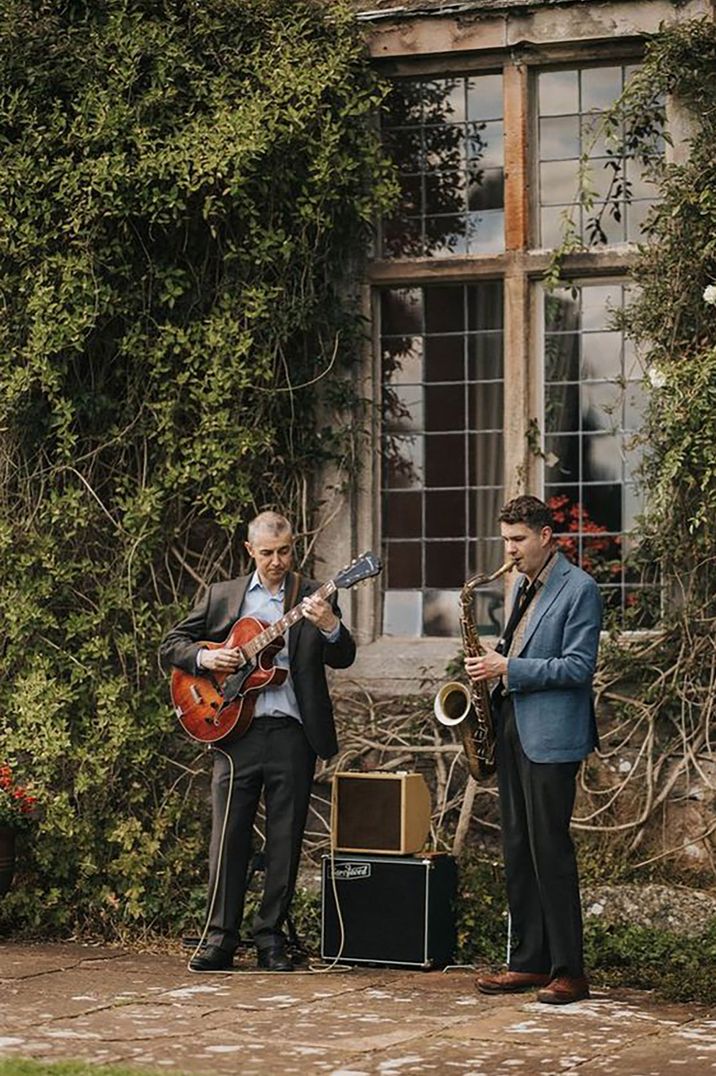 Band duo plays for stag party idea at country house venue 