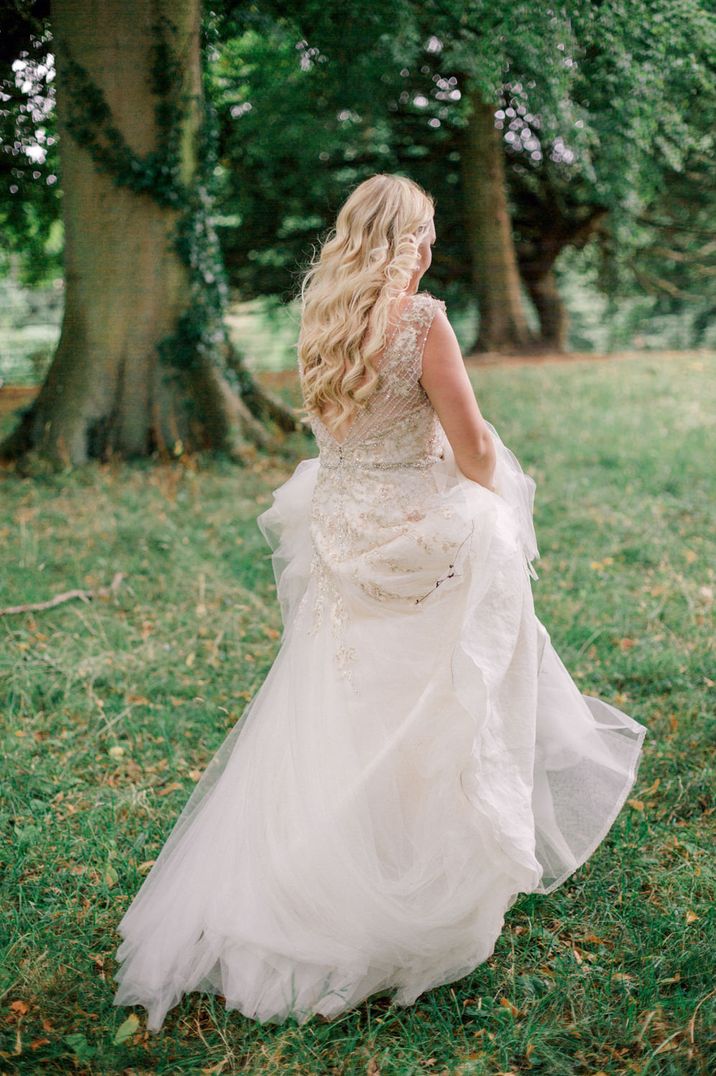 Lace and embroidered cross hatch detail princess wedding dress by Lucy Davenport Photography