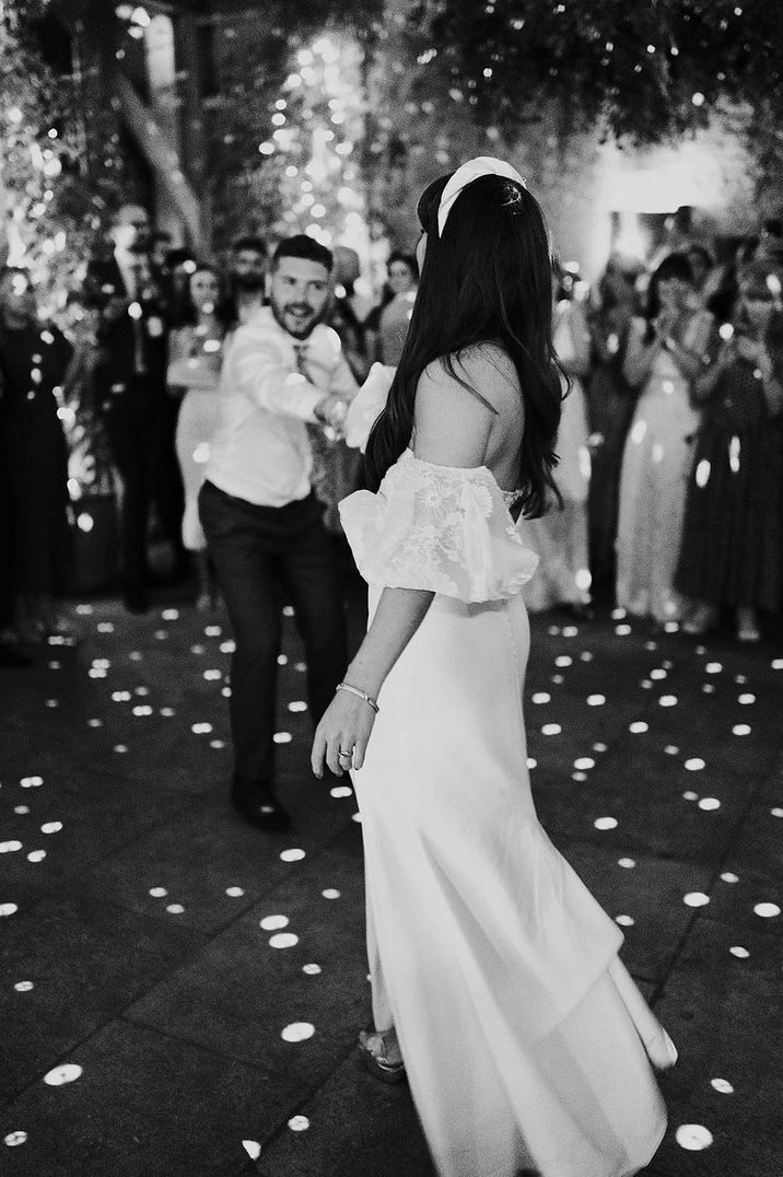 Bride & groom dance on their wedding day during reception party