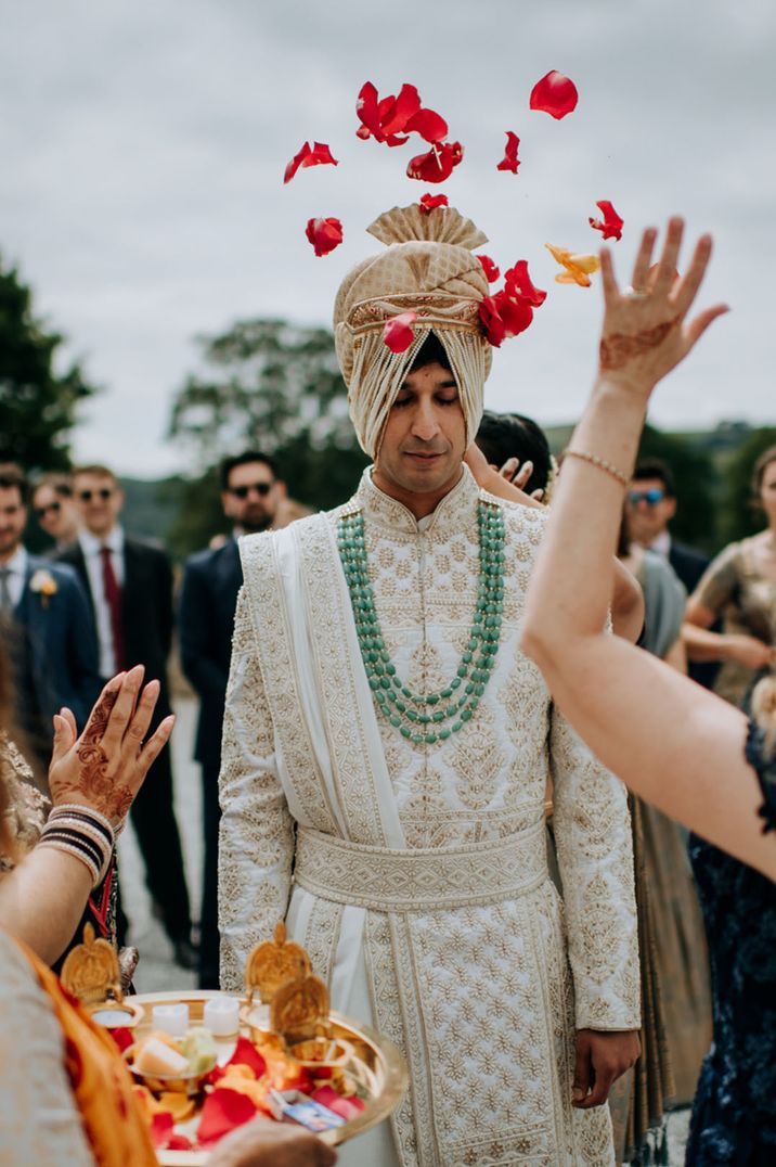 Outdoor Haldi wedding ceremony for the same sex multicultural wedding at Tithe Barn