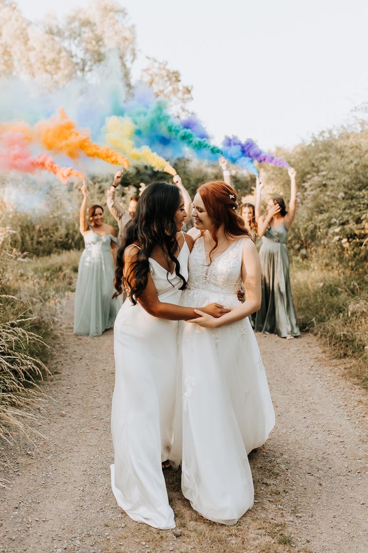 Rainbow smoke flare for LGBTQI wedding photo by Wyldbee Photography