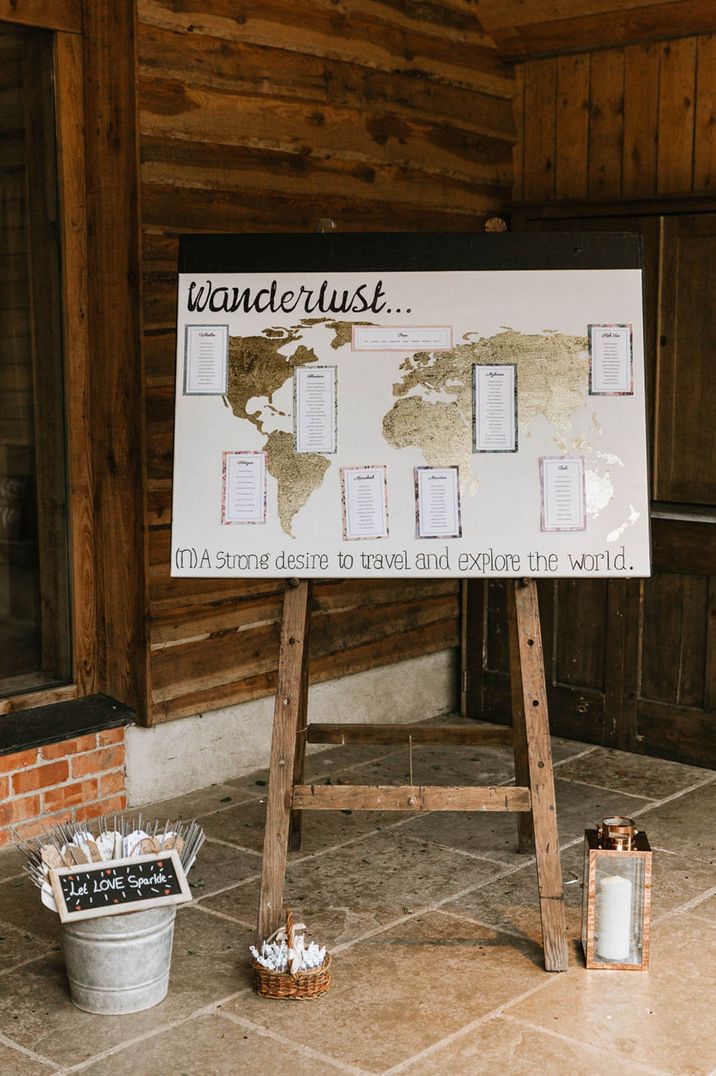 Gold world map wedding table plan 