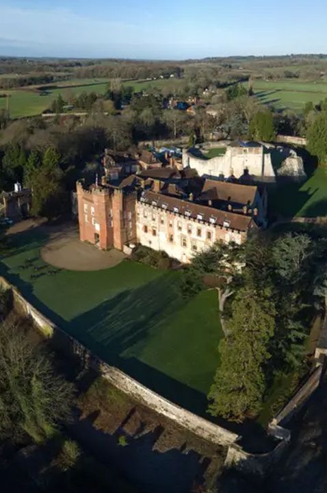 Birdseye view of Farnham Castle wedding venues with manicured lawns, acres of grounds and the castle itself 