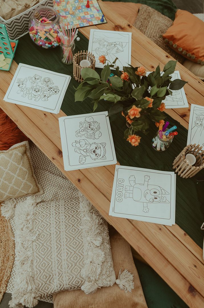 How to manage kids at weddings with a fun kids activity table with colouring pages and crayons