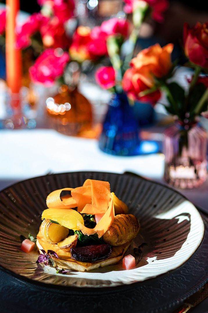 Salt celeriac, Hasselback potatoes, spinach, beetroot, carrot ribbons vegan wedding breakfast main dish by Taste Caterer 