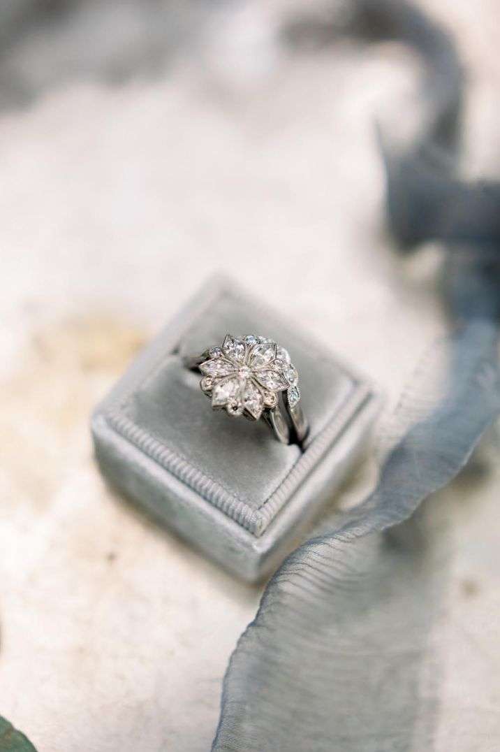 Unique floral diamond engagement ring in grey velvet ring box 