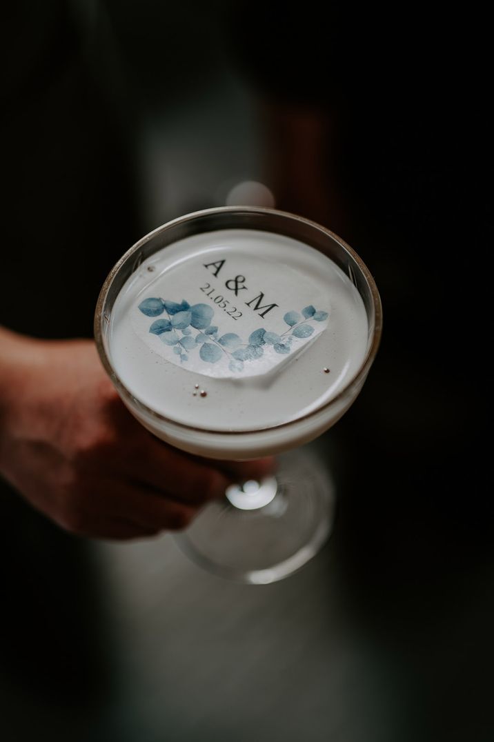 Pornstar martinis with custom drink topper with the bride and groom's initials 