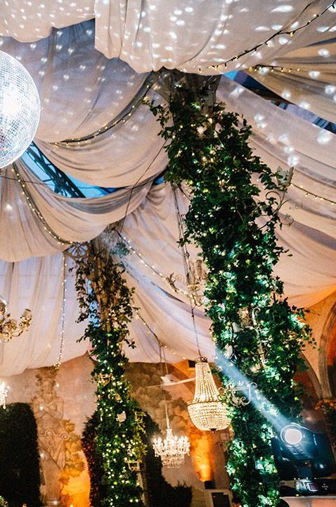 disco-ball-chandeliers-and-foliage-decorate-castle-wedding