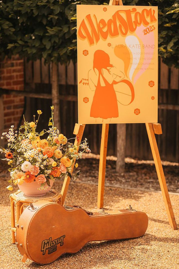 Retro yellow and orange wedding welcome signage 